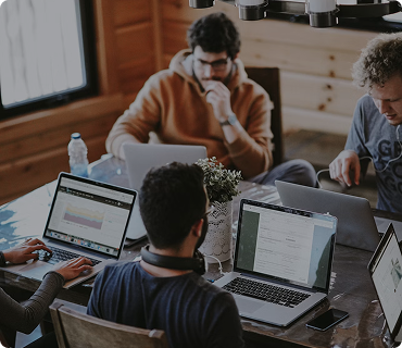 Custom software development team working together